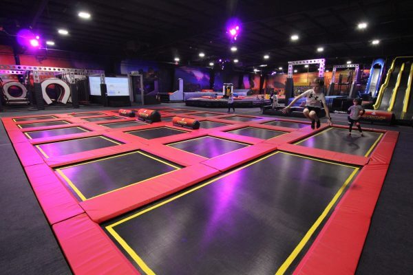 kids jumping at a trampoline park
